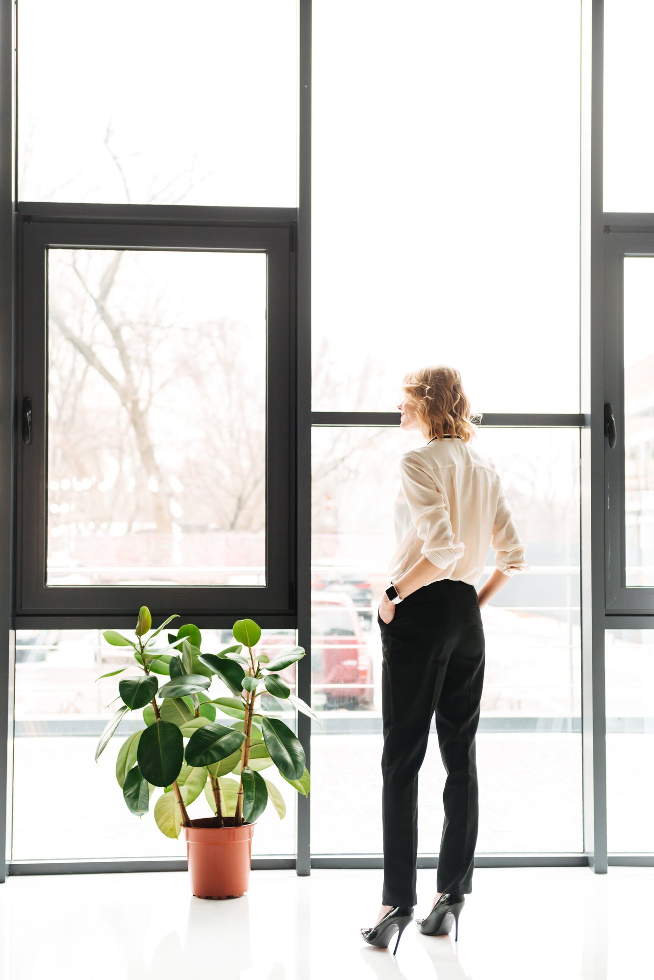 back-view-of-a-young-businesswoman-2022-03-30-20-23-28-utc